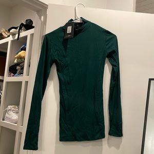 Green turtle neck long sleeve shirt
